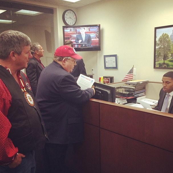 Cowboy Indian Alliance members Art Tanderup and Rosebud Sioux Tribe President Cyril Scott visit Sen. Mary Landrieu's office on Nov. 18, 2014.