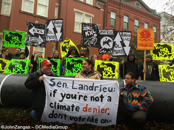 Cowboy Indian Alliance members Art Tanderup, Greg Grey Cloud and Aldo Seoane at Monday's protest outside Sen. Landrieu's house. (Photo by 